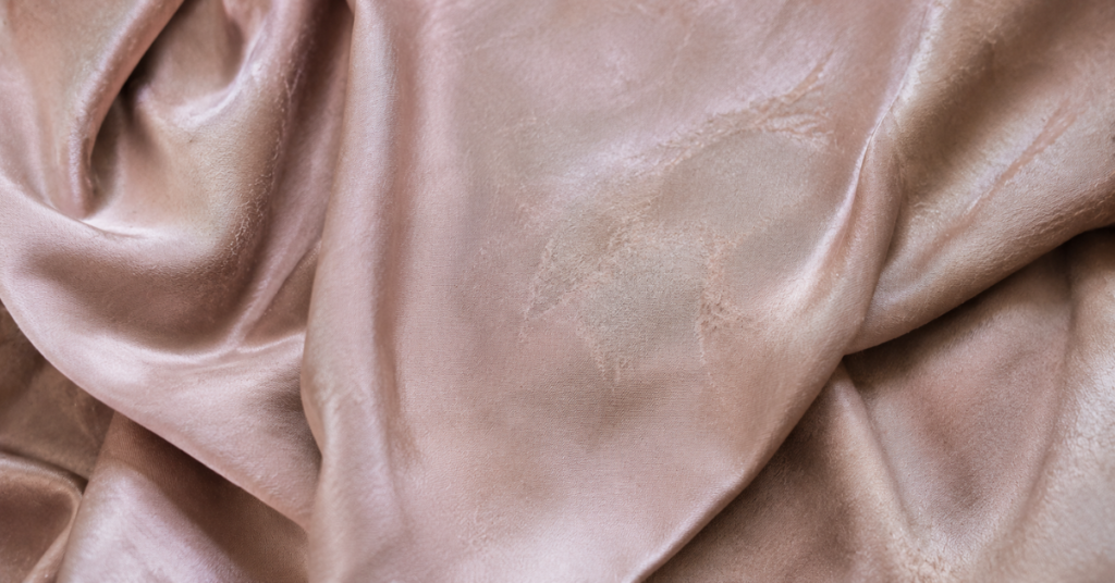 delicate silk fabric damaged and faded due to vinegar cleaning