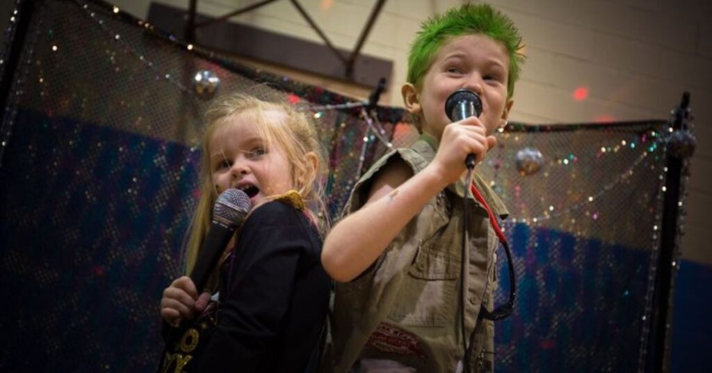 Winter Wonderland Party setup with white decorations, fairy lights, and cozy festive atmosphere